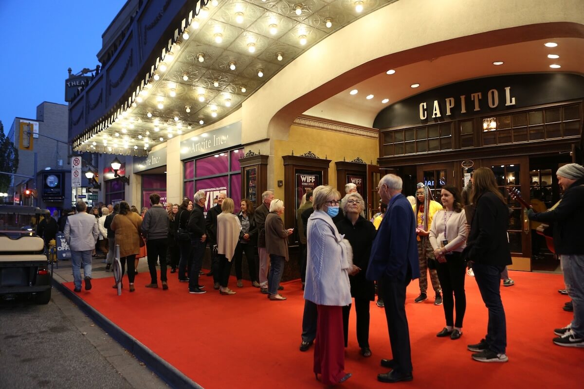 Windsor International Film Festival (WIFF) red carpet at the Capitol Theatre. People are lined up to attend the film festival.